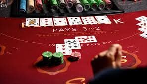 rajawin login platform interface showing live dealer tables, slot games, and sportsbook sections